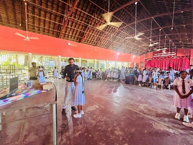 Students experiencing VR technology at Ampara